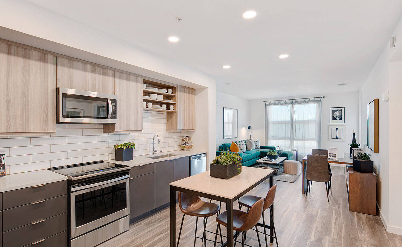 Encore Property apartment with kitchen area.